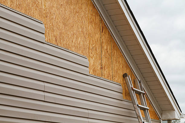 Professional Vinyl Siding technician working in Union City, NJ